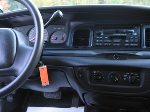 2001 Ford Crown Victoria - Interior view of a 2001 Ford Crown Victoria, highlighting the dashboard layout and controls.