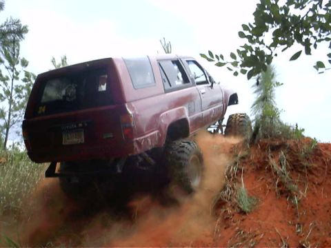 1985 Ford Bronco - in a ravine, 90 degree turn to go over ledge to get back into the sand "playground"