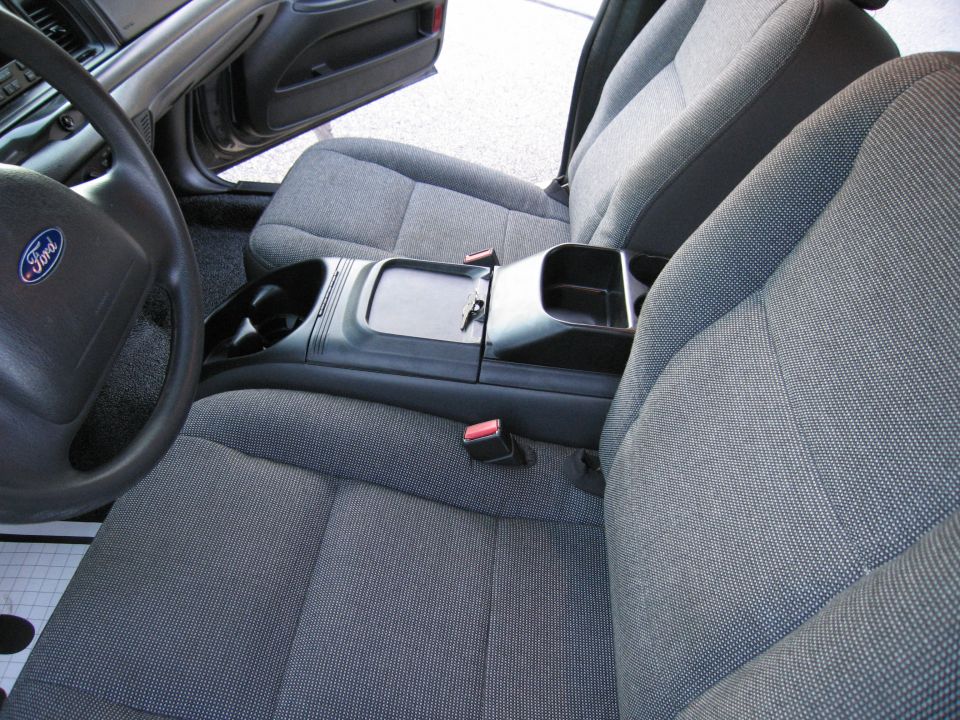 Front bench seat and floor console of a Ford Crown Victoria interior