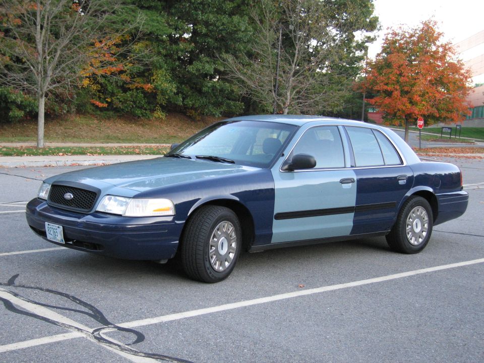 Two-tone blue Ford Crown Victoria front three-quarter view