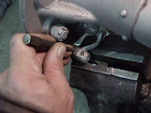 1913 Ford Model T - The head of the rivet was ground away with a rotary file, then a punch used to remove the rivet.