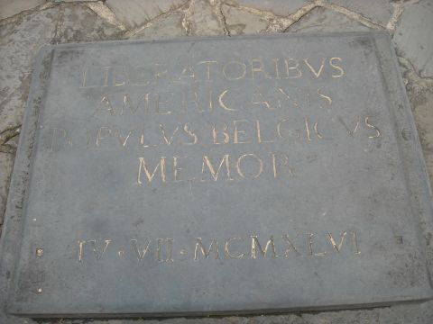 1979 Ford F-150 - A stone plaque bears a Latin inscription commemorating American liberators, with Roman numerals indicating the year 1946.