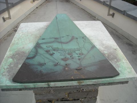 1979 Ford F-150 - A topographical map displays terrain and pathways, mounted on a marble pedestal.