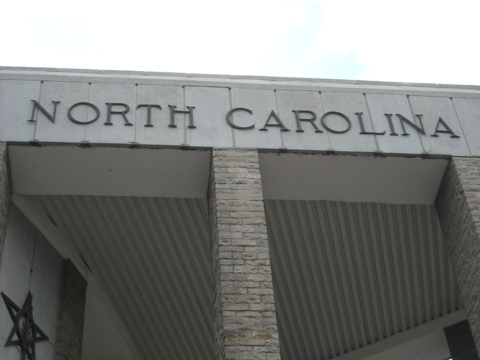Building facade with carved NORTH CAROLINA lettering