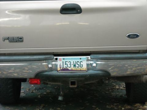 1979 Ford F-150 - The rear of a Ford F-250 Super Duty truck is shown, an Arizona license plate.