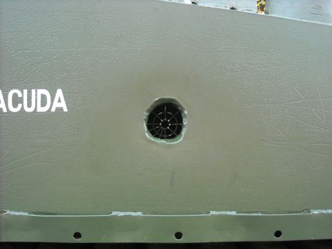 1979 Ford F-150 - Side panel detail with partial text and a circular vent.