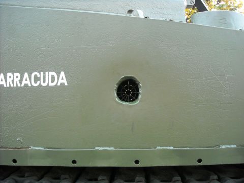 1979 Ford F-150 - Side panel of a military vehicle, possibly a tank, with the name ARRACUDA visible.
