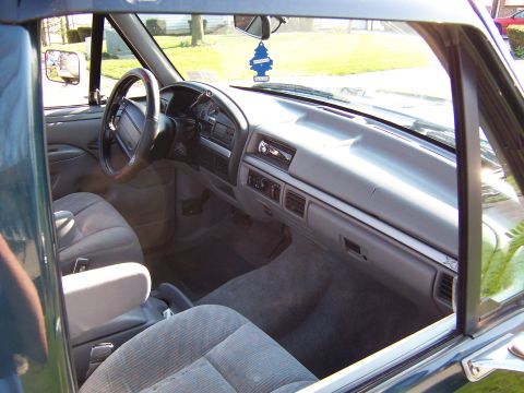 1995 Ford Bronco - Interior view of a 1995 Ford Bronco, the dashboard and seating area.