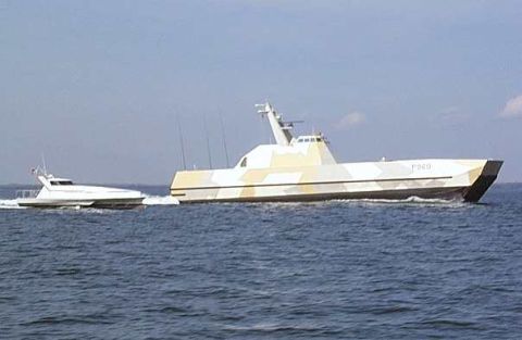 1978 Ford F-250 - Two boats are seen sailing on the water under a clear sky.