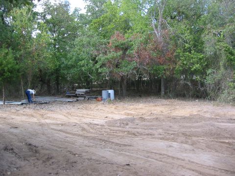 1996 Ford Bronco - Construction materials and a person are visible in this outdoor scene.