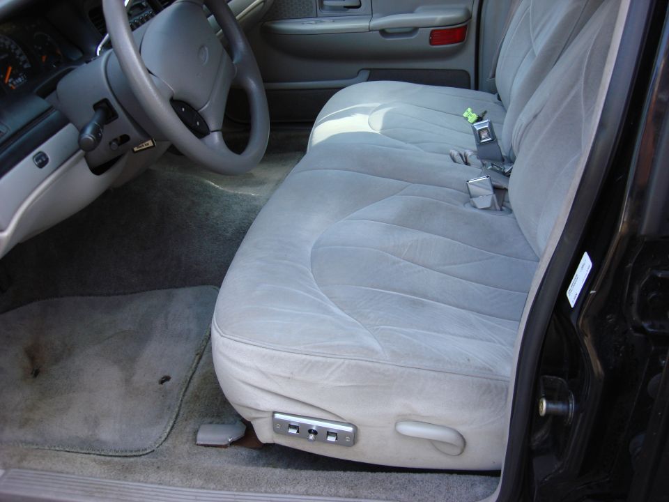 Front passenger seat and dashboard of a 2003 Ford Crown Victoria