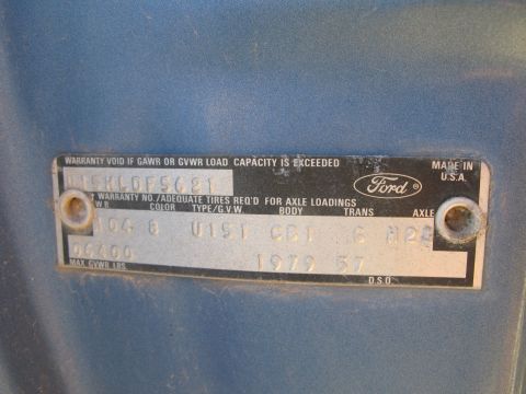 1979 Ford Bronco - Close-up of a vehicle identification plate showing manufacturing details and the year 1979.