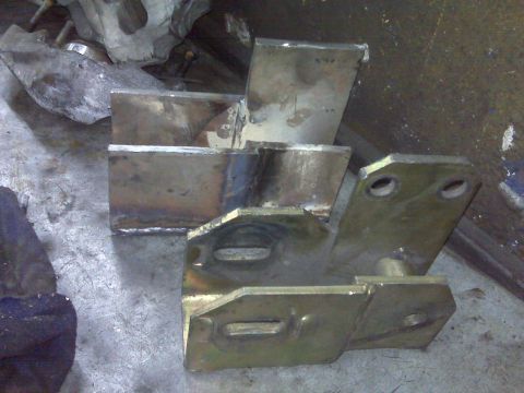1980 Ford Bronco - These metal brackets appear to be custom-fabricated parts, not a complete vehicle.