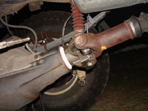 1996 Ford F-150 - Close-up view of the rear axle and driveshaft components of a vehicle.