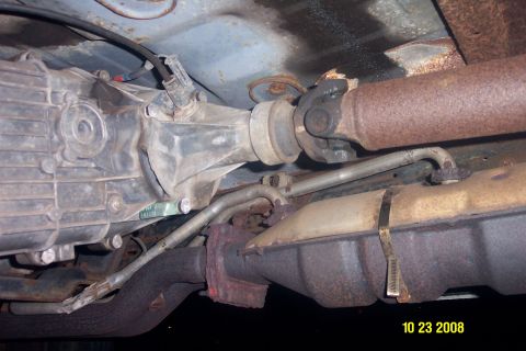 1992 Ford Bronco - The photo shows the underside of a vehicle, focusing on the drivetrain and exhaust components. A watermark indicates the photo was taken on…