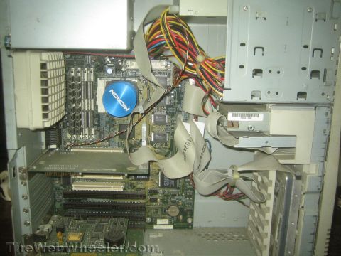 1968 Ford Mustang - Internal components of a desktop computer, including motherboard, fan, and wiring.
