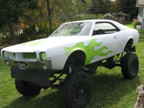 1978 AMC Javelin - This heavily modified car features a lifted suspension and custom flame paintwork.