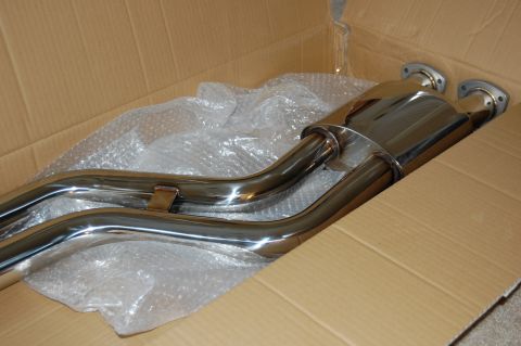 2002 BMW M3 - New exhaust system part, likely for a BMW M3, packaged in a cardboard box.