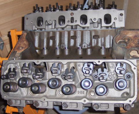 1978 Ford Bronco - Close-up view of internal engine components, including valves and springs, during assembly or disassembly.