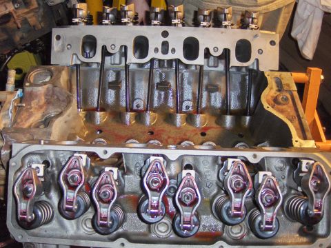 1978 Ford Bronco - Close-up of an engine block's internal components, including the valve train, during assembly or maintenance.