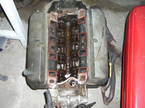 1988 Ford Bronco - Engine block with intake manifold removed, revealing internal components and ports.