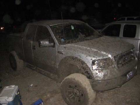 1979 Ford Bronco - This pickup truck is covered in mud, suggesting it has been driven off-road.