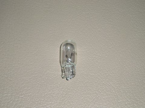 2001 Ford F-350 - A single automotive light bulb is shown against a textured background. The registry information for a 2001 Ford F-350 is likely incorrect f…