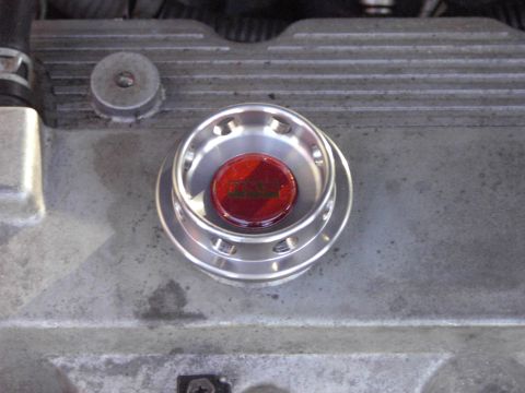 1991 Ford Probe - An aftermarket engine oil cap with a red insert text is shown in detail.