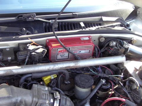 1991 Ford Probe - Close-up of an engine bay an MSD Ignition box and associated wiring.