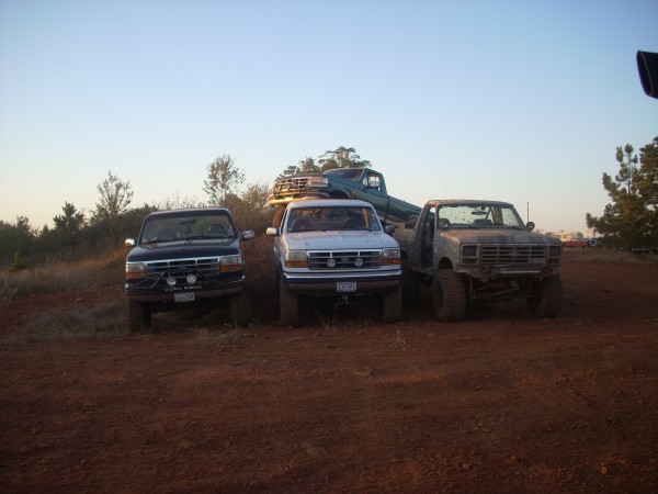 1992 Ford Bronco front view, black, lifted, with aftermarket bumper and lights