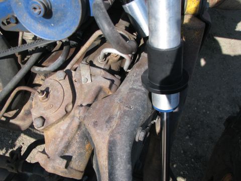1983 Ford F-250 - Close-up of a Ford steering box and shock absorber, likely from an older truck.