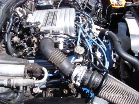 1973 Ford Ranchero - The engine bay features a Ford 5.0 HO engine with visible wiring and air intake components.