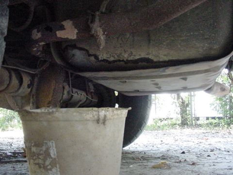 1994 Ford Bronco - see the nail sticking out?...lower left side of the gas tank