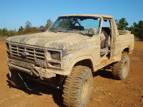 2008 International School Bus - This heavily modified Ford pickup truck appears to be from the early 1980s, not a 2008 school bus.