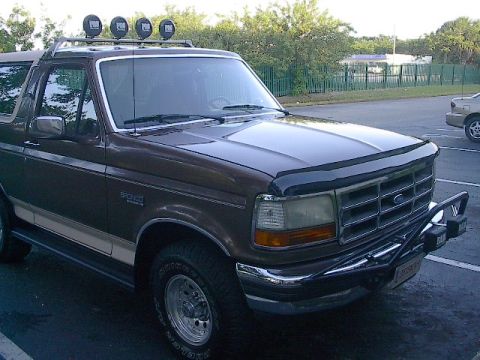 1992 Ford Bronco - This 1992 Ford Bronco is equipped with a roof rack and auxiliary lights.