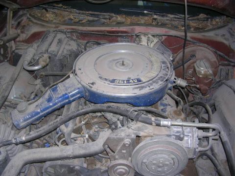 1975 Ford Ranchero - Engine bay of a 1975 Ford Ranchero, the 351-4V air cleaner assembly and various engine components.