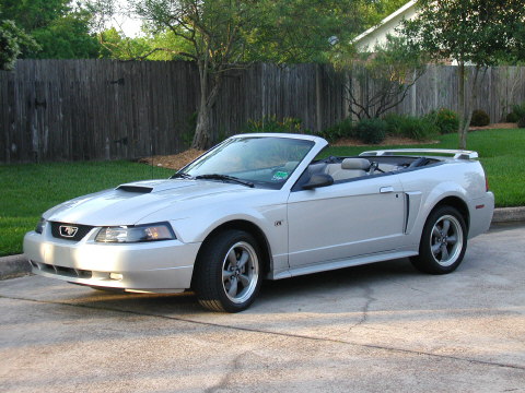 2002 Ford Mustang - This silver 2002 Ford Mustang convertible is shown from the front three-quarter angle.