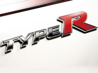 1992 Ford Bronco - A close-up shot of the 'Type R' emblem, with Supermotors branding at the bottom.