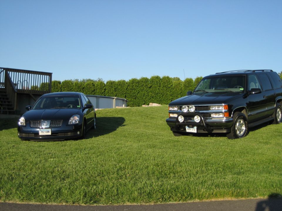 Black 1995 Chevrolet Tahoe 3q-front view with aftermarket lights