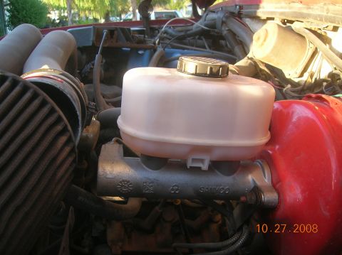 1985 Ford Bronco - The brake master cylinder and reservoir are visible in the engine bay, with a date stamp of 10.27.2008.
