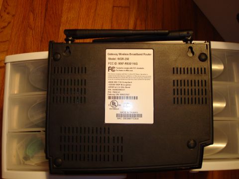 1977 Ford F-100 - The underside of a Gateway Wireless Broadband Router, showing its model number, FCC ID, and manufacturing details.
