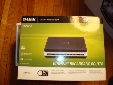 1977 Ford F-100 - The box for a D-Link EBR-2310 Ethernet Broadband Router is shown, displaying product information and an image of the device.