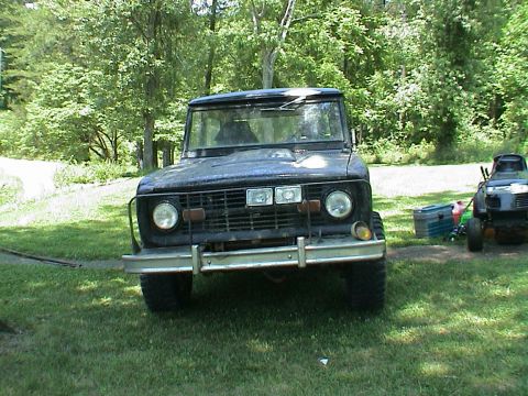 1972 Ford Bronco - Front view of a 1972 Ford Bronco parked outdoors on a grassy area.