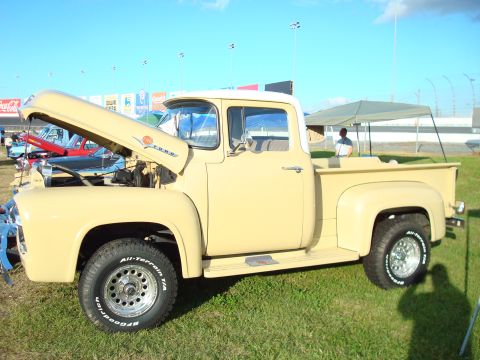 1977 Ford F-100 - This Ford F-series truck has its hood open, showing the engine bay.