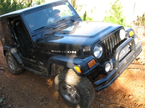 1993 Ford Bronco - avoiding a huge rut by getting up on the side