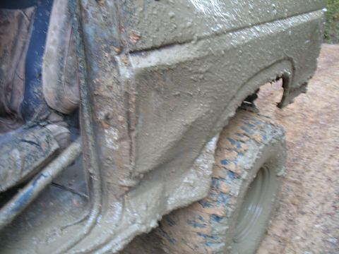 1993 Ford Bronco - steep mud hole + flex + 38s = Jack's miracle self-clearanceing fenders