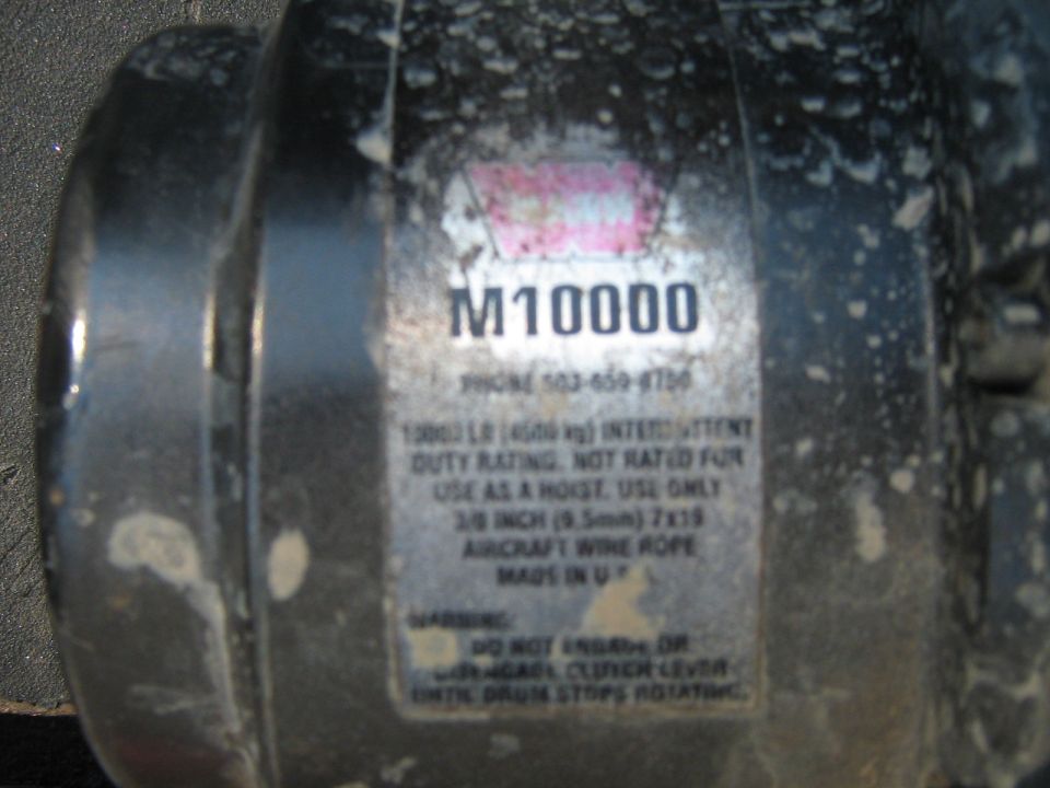 close-up of M10000 winch label with phone number and duty rating