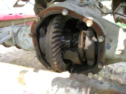 1988 Ford Bronco - The internal workings of a vehicle's differential are exposed for inspection.