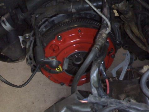 1993 Ford Probe - This image shows a close-up view of a vehicle's clutch and flywheel assembly, not a complete car.
