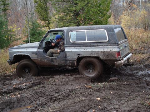 1988 Chevrolet Blazer - Muddy 1988 Chevrolet Blazer navigating a difficult off-road trail.